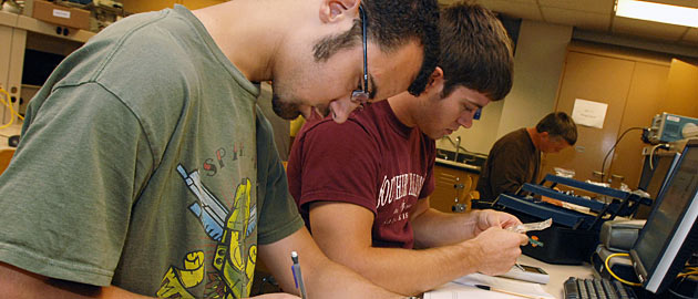 students working on computer