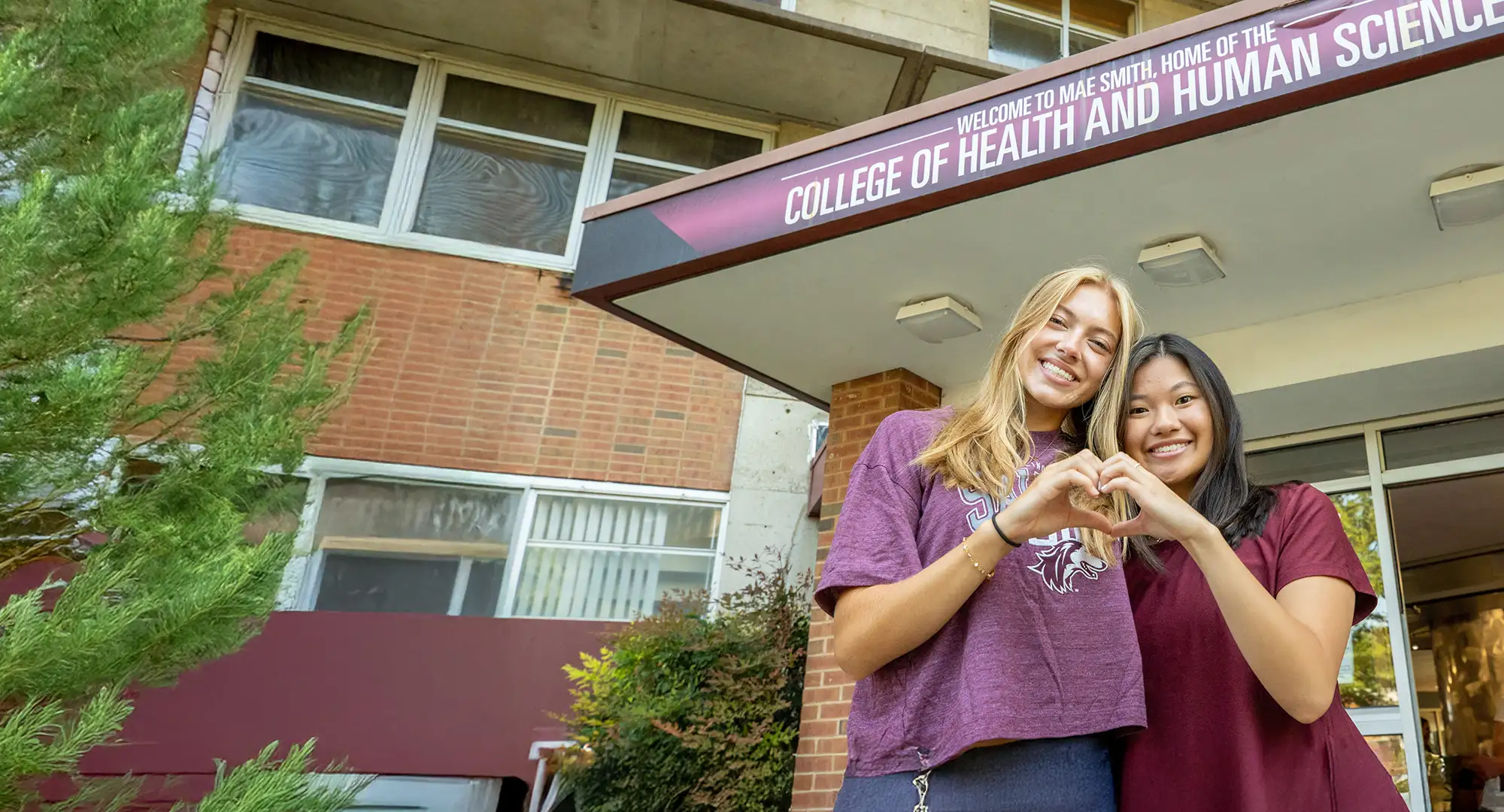 Two students outside the dorms at SIU.